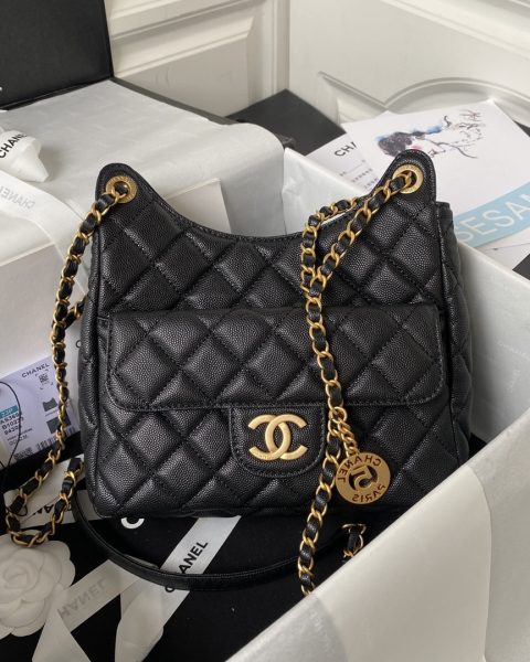 CHANEL Caviar Quilted Wavy CC Hobo in Black